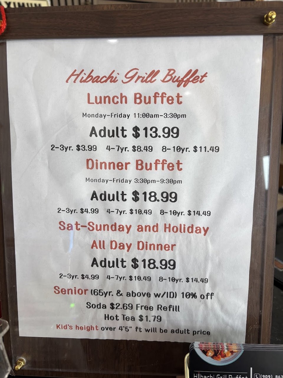 Printed buffet menu with lunch and dinner sections.